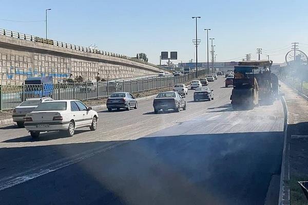 اجرای آسفالت طرح تبادل تا میدان بسیج توسط شهرداری منطقه ۵